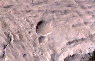 Illustration for article titled Mars Gets a New Crater, We Find it Within a Day